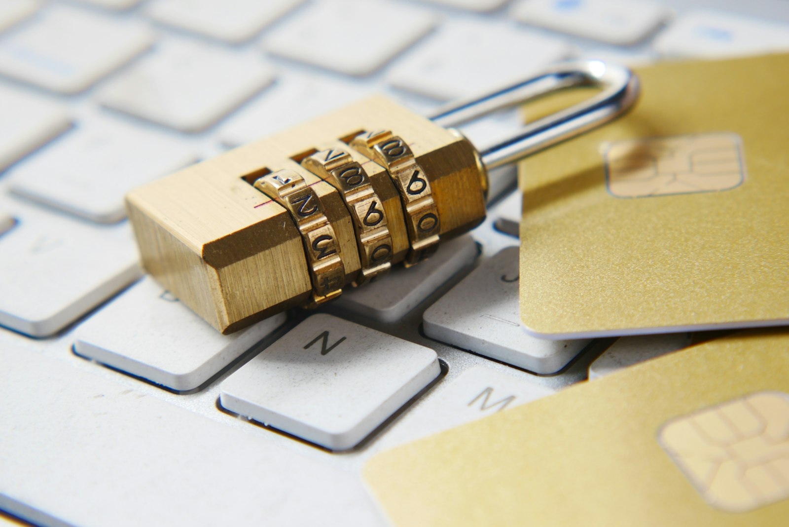 Padlock on a keyboard representing HIPAA data security and PHI protection